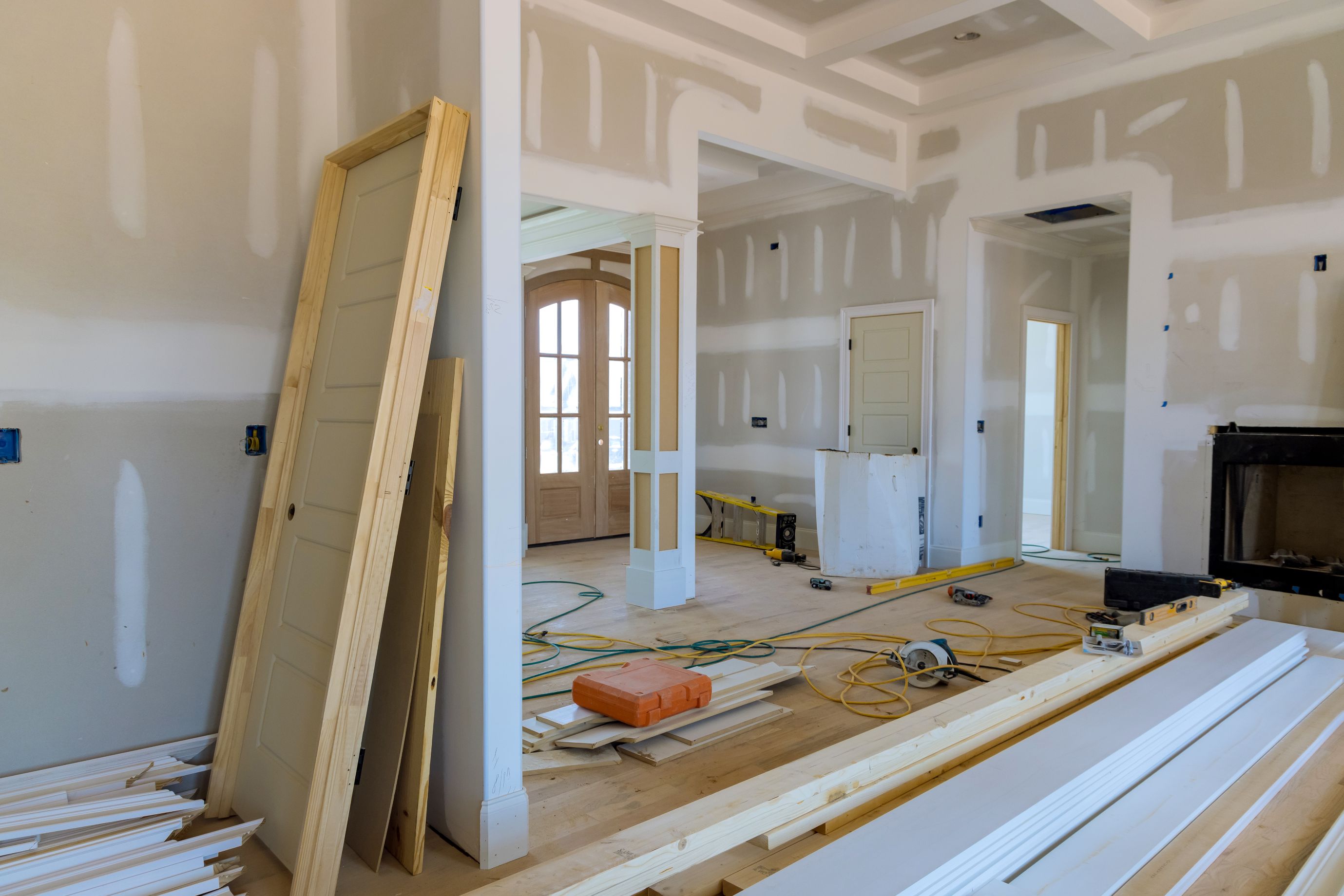 new-house-construction-with-stacker-wooden-material-door-molding-trim